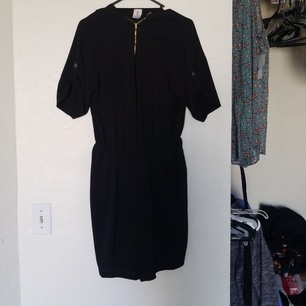 Worn once maybe. Brand new cute black romper.